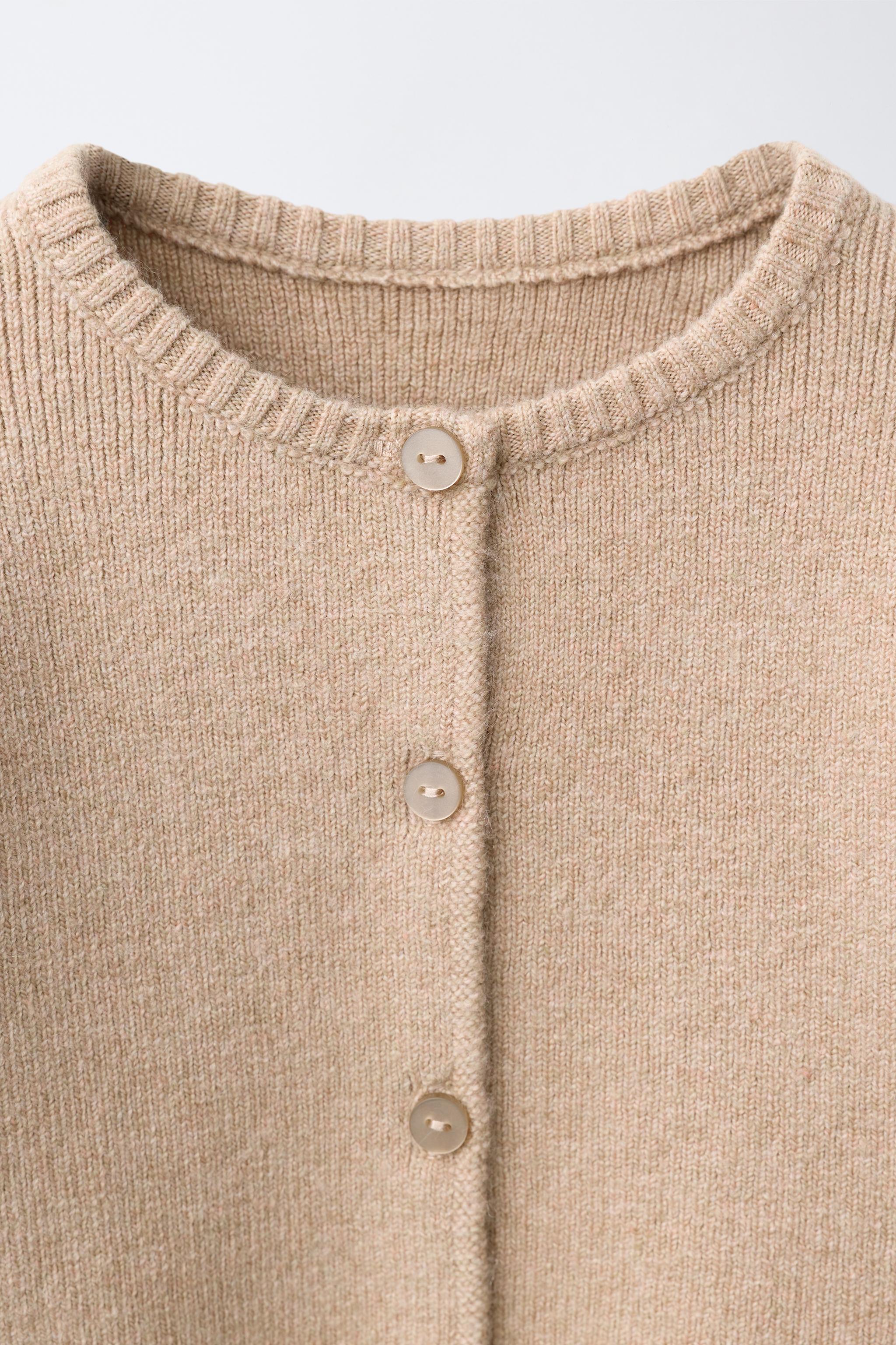 GILET EN MAILLE À VOLANTS